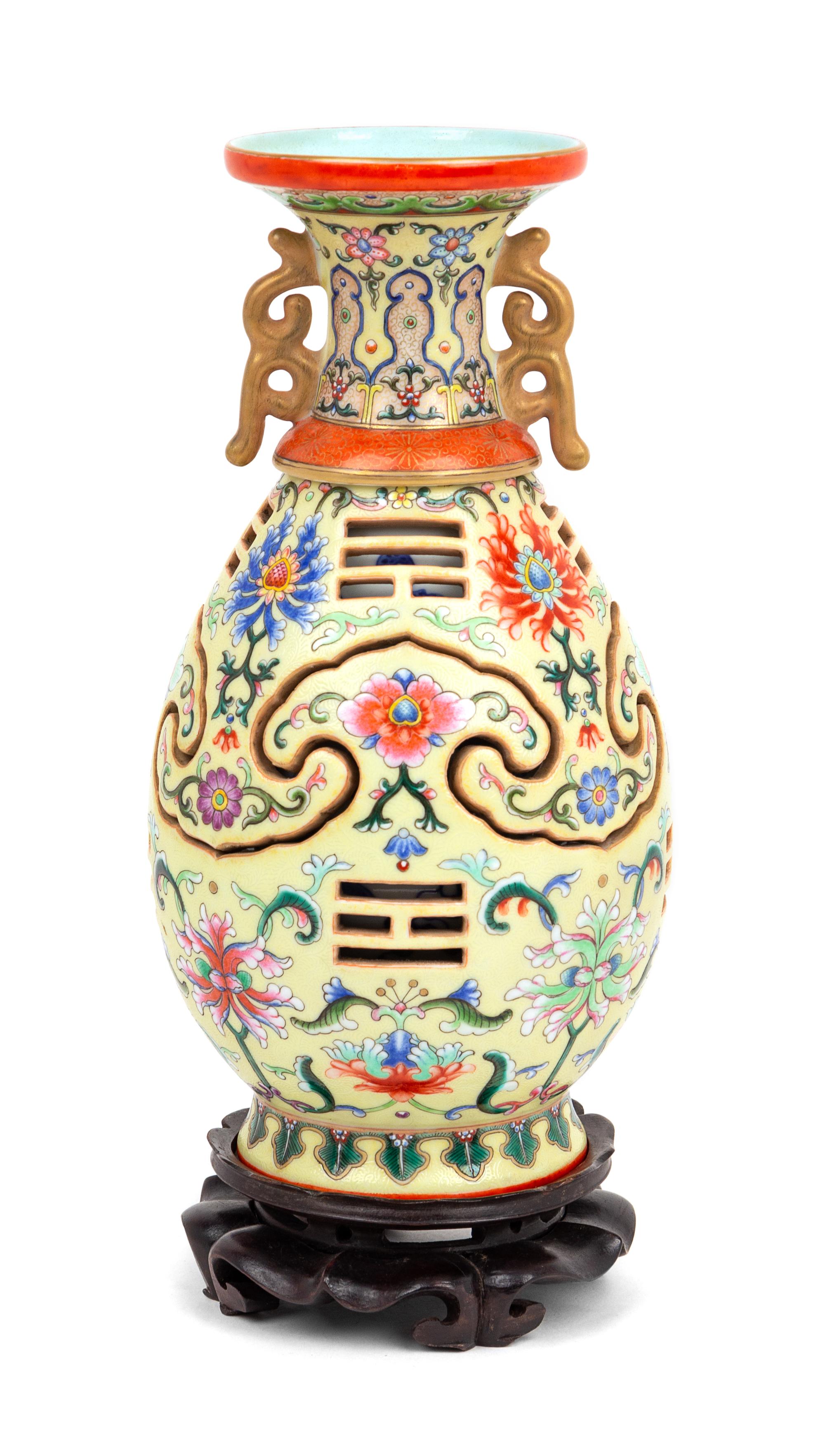 A Yellow Ground Famille Rose Porcelain Reticulated Vase Height 8 3/8 inches. — 20TH CENTURY