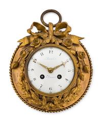 A Louis XVI Gilt Bronze Wall Clock