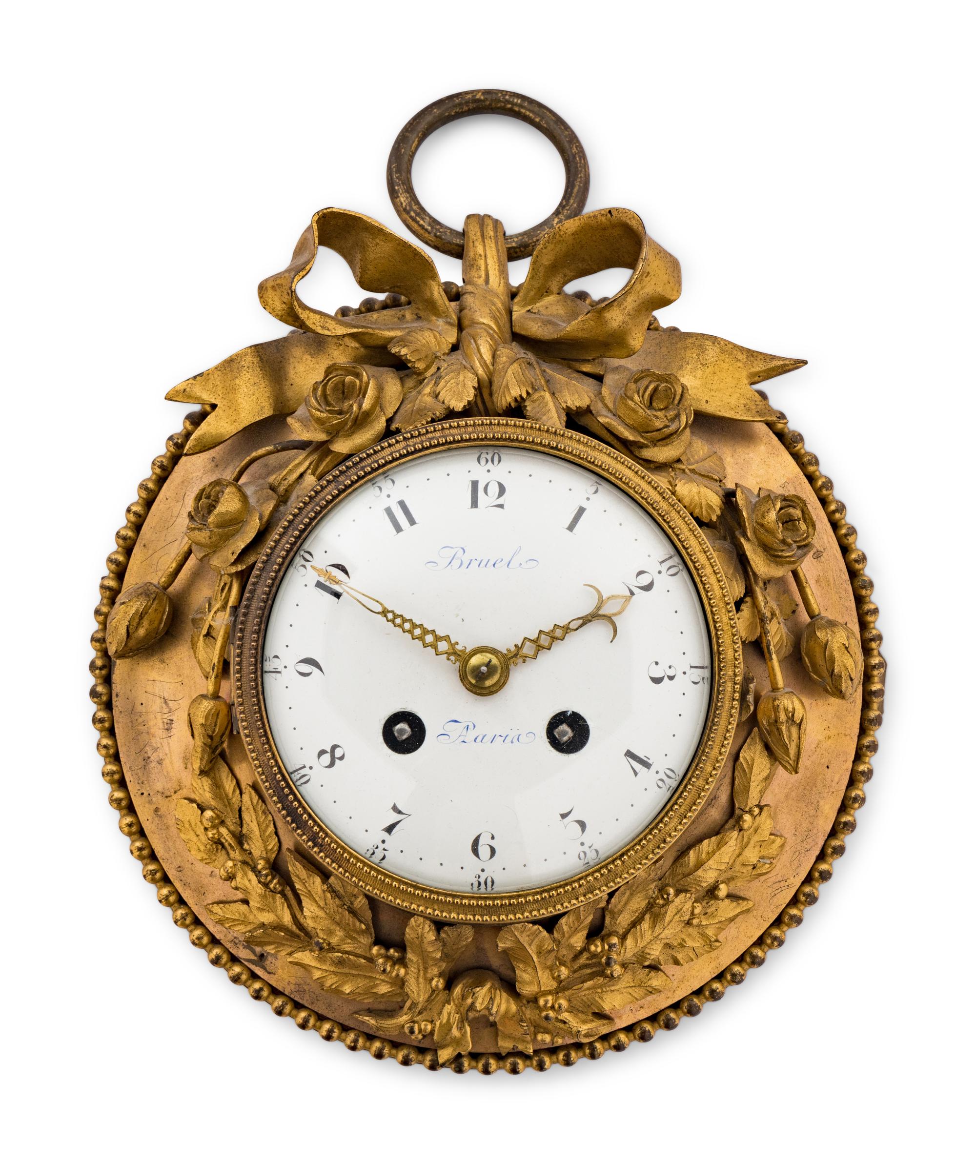 A Louis XVI Gilt Bronze Wall Clock