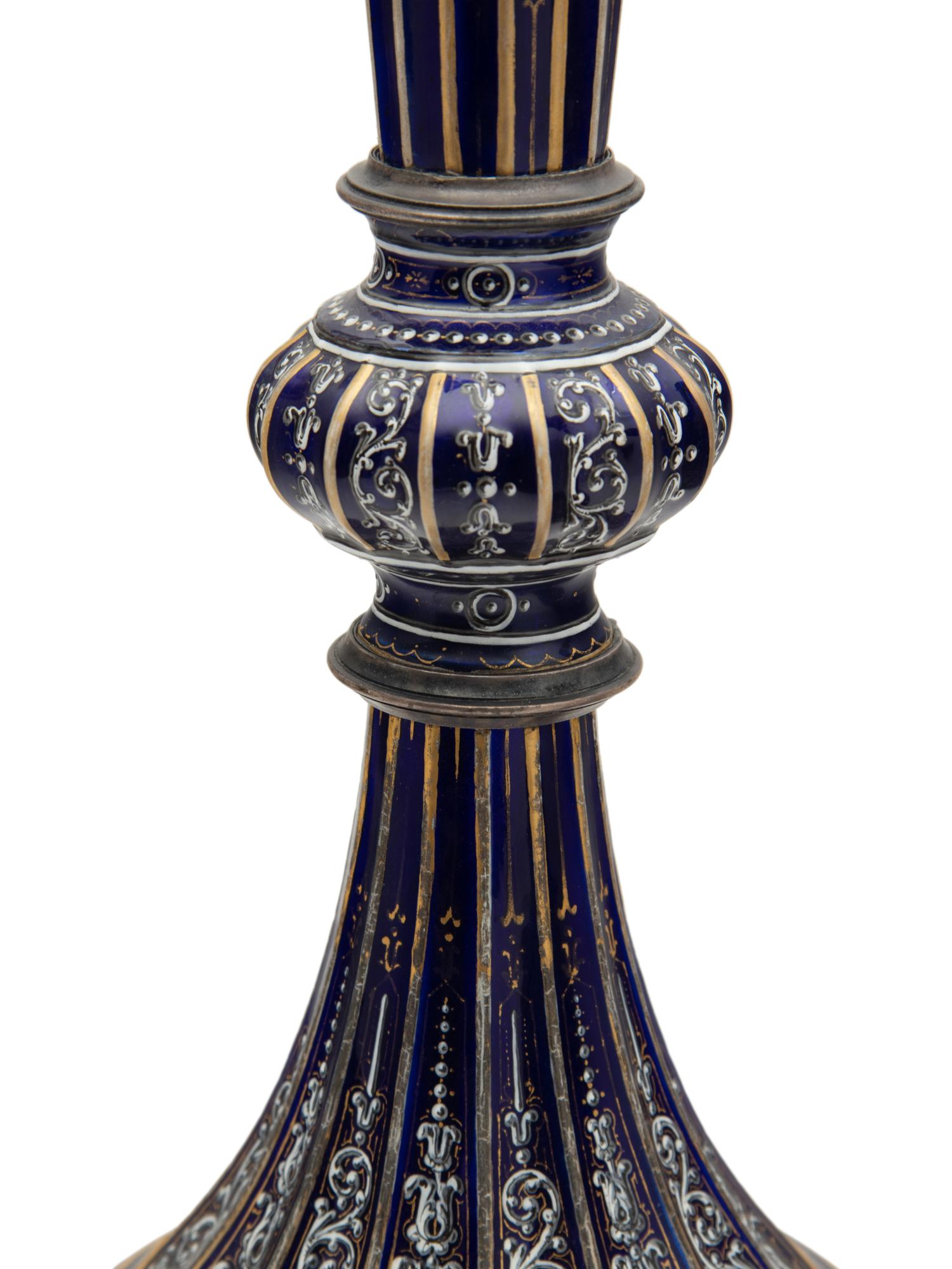 A Pair of Continental Gilt and Enameled Cobalt Glazed Porcelain Vases