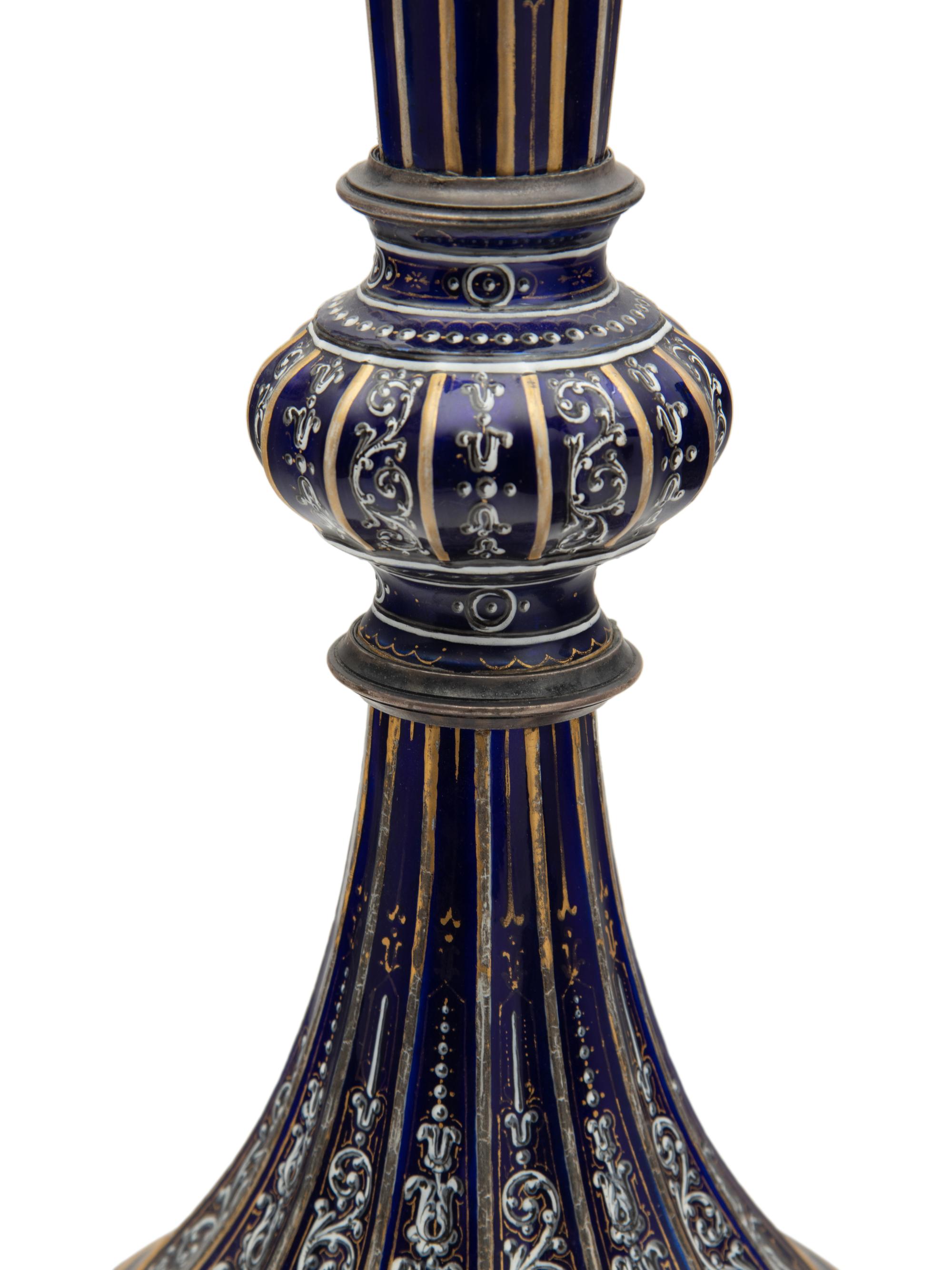 A Pair of Continental Gilt and Enameled Cobalt Glazed Porcelain Vases