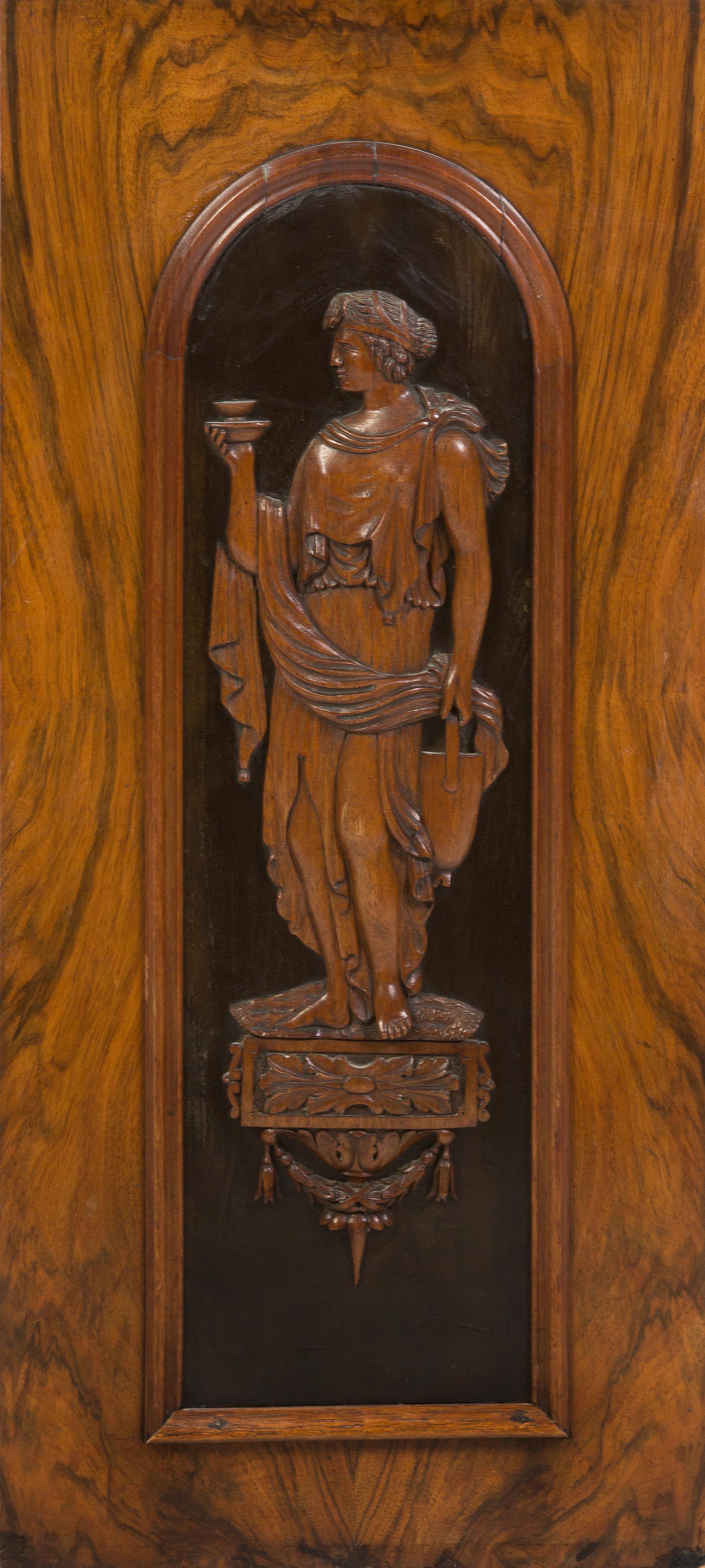 A Neoclassical Style Carved Walnut Panel, Height 24 1/4 x width 11 inches overall.