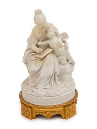 A Sèvres Style Gilt Bronze Mounted Bisque Porcelain Group