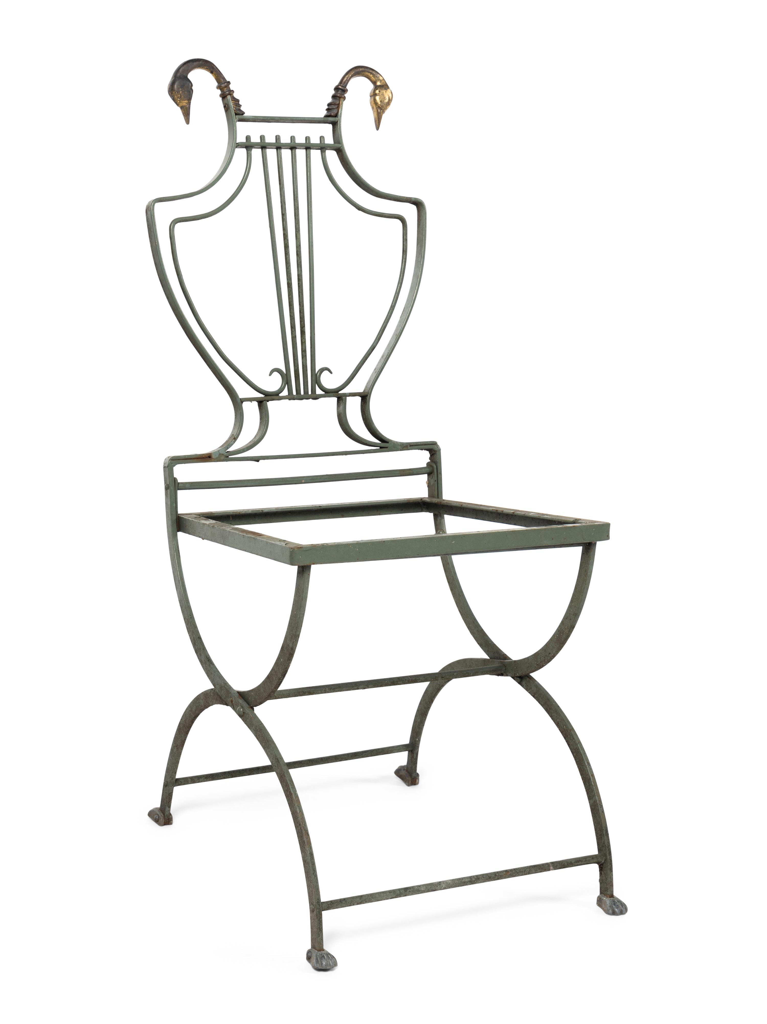 A Set of Four Painted Metal Folding Garden Chairs