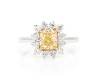 An 18 Karat White Gold, Colored Diamond and Diamond Ring, 3.10 dwts.