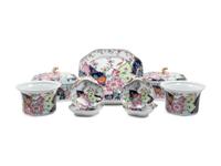 A Collection of Mottahedeh Tobacco Leaf Porcelain Articles