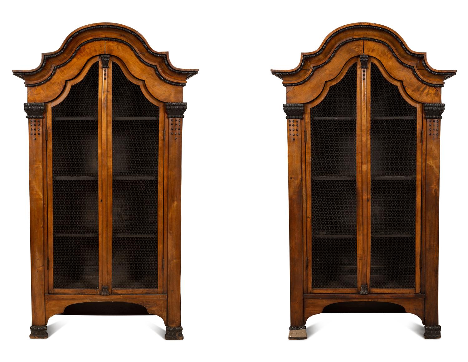 A Pair of Biedermeier Part-Ebonized Fruitwood Bookcases