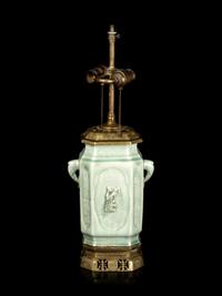 A Chinese Molded Celadon Glazed Vase