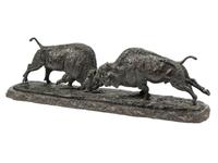 A Patinated Metal Figural Group of Buffalo