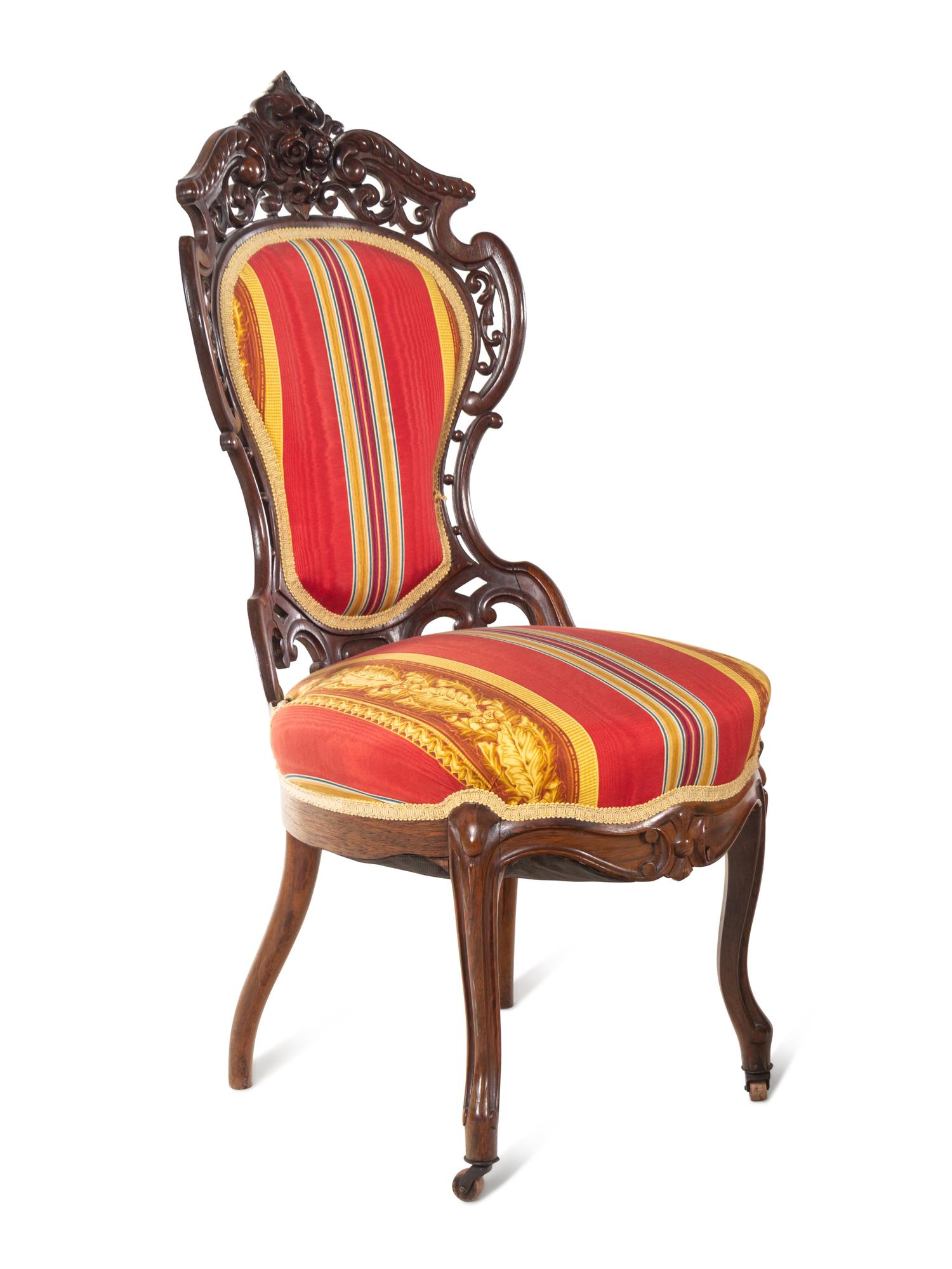 A Renaissance Revival Laminated and Carved Rosewood Three-Piece Parlor Suite