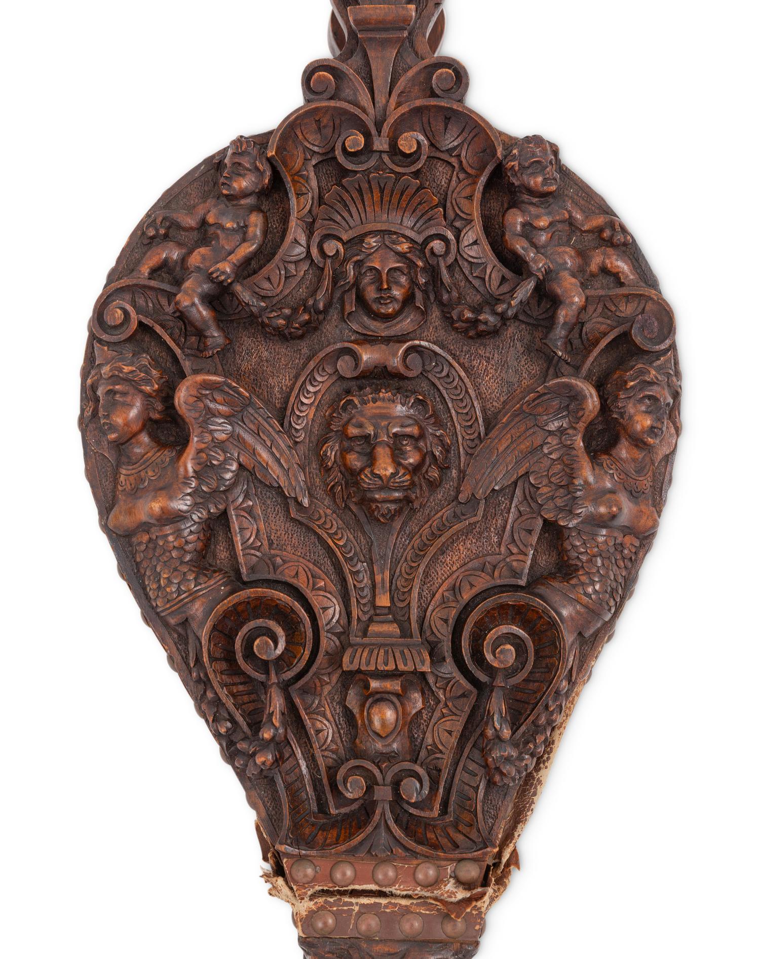 An Italian Carved Walnut Bellows