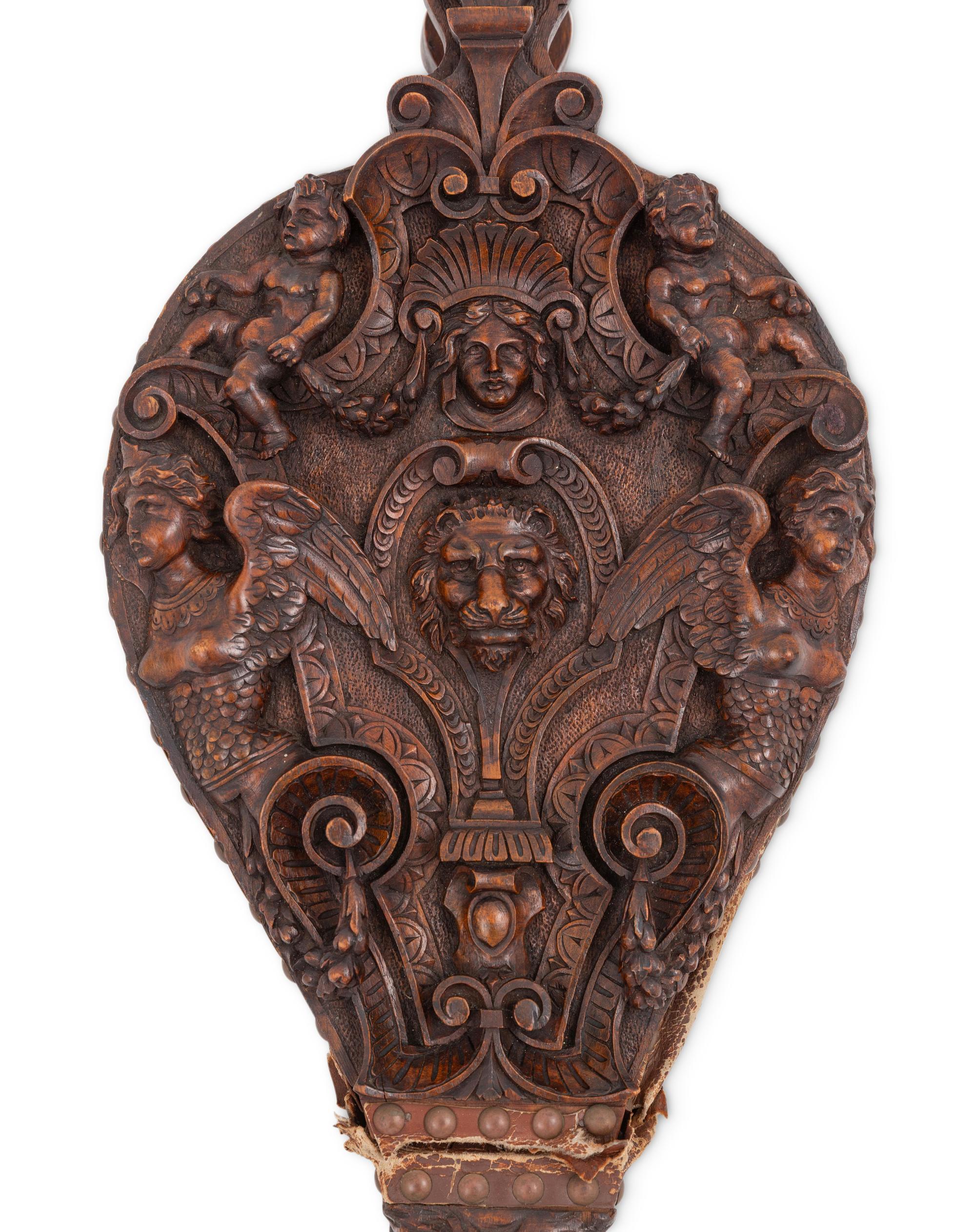 An Italian Carved Walnut Bellows