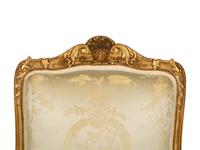 A Set of Four Régence Style Giltwood Side Chairs — Late 19th/Early 20th Century