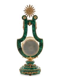 A Louis XIV Style Gilt Metal Mounted Malachite Veneered Harp Clock