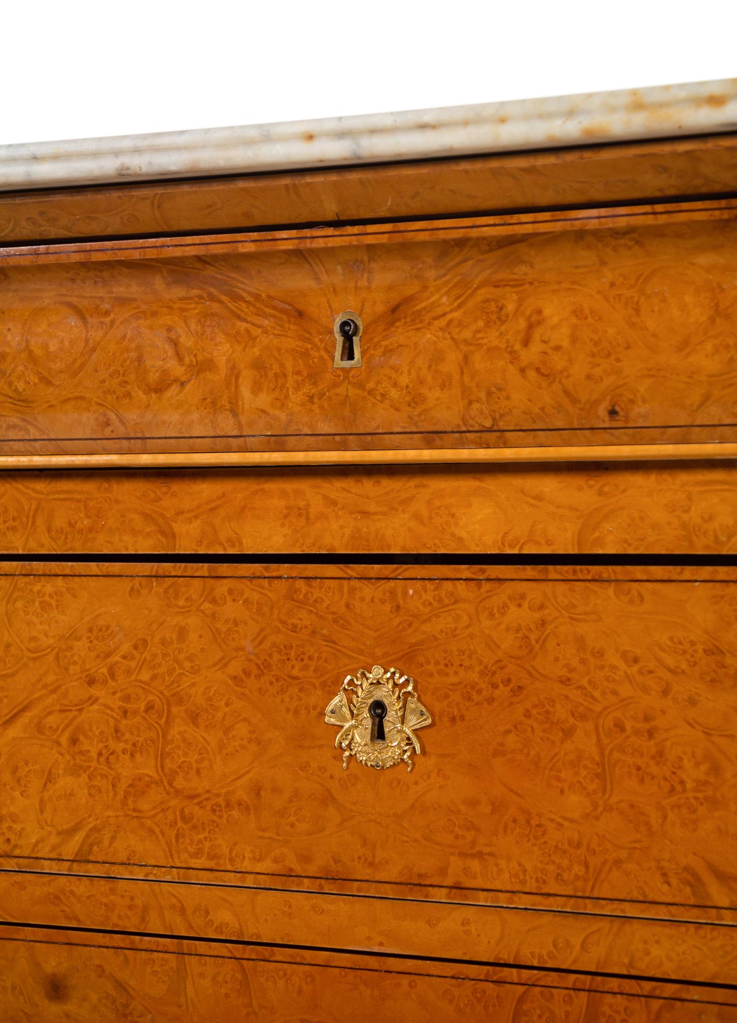 A Louis Philippe Burlwood Marble-Top Commode