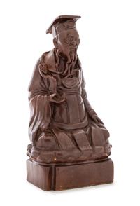 A Chinese Brown Glazed Porcelain Figure of an Immortal Height 10 inches.