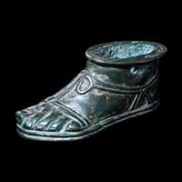 A Roman Bronze Lamp in the form of a Foot