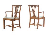 A Set of Four George III Style Walnut Dining Chairs