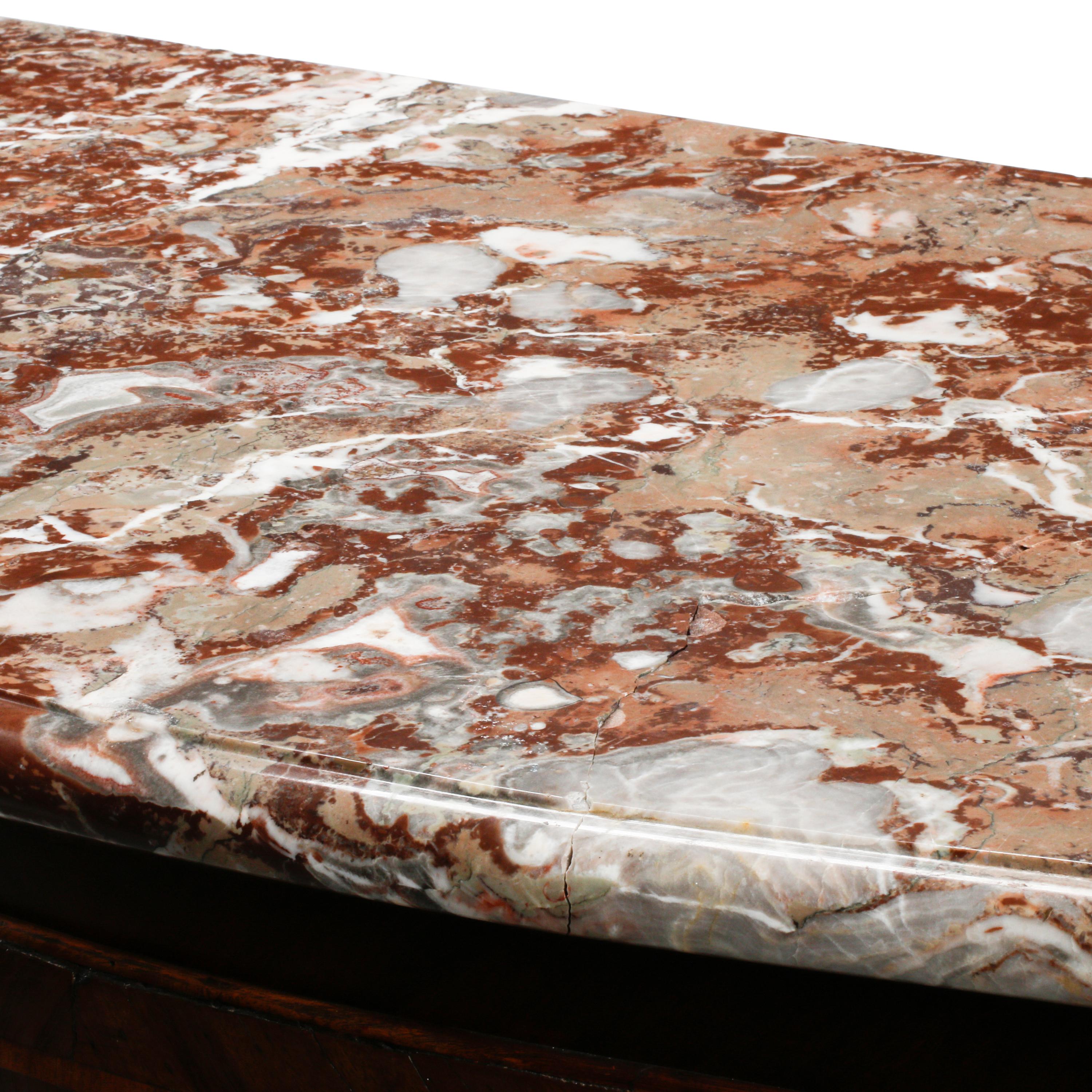 An Italian Walnut and Marquetry Marble-Top Commode