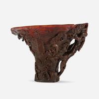 A Chinese Carved Rhinoceros Horn Libation Cup 17th/18th century