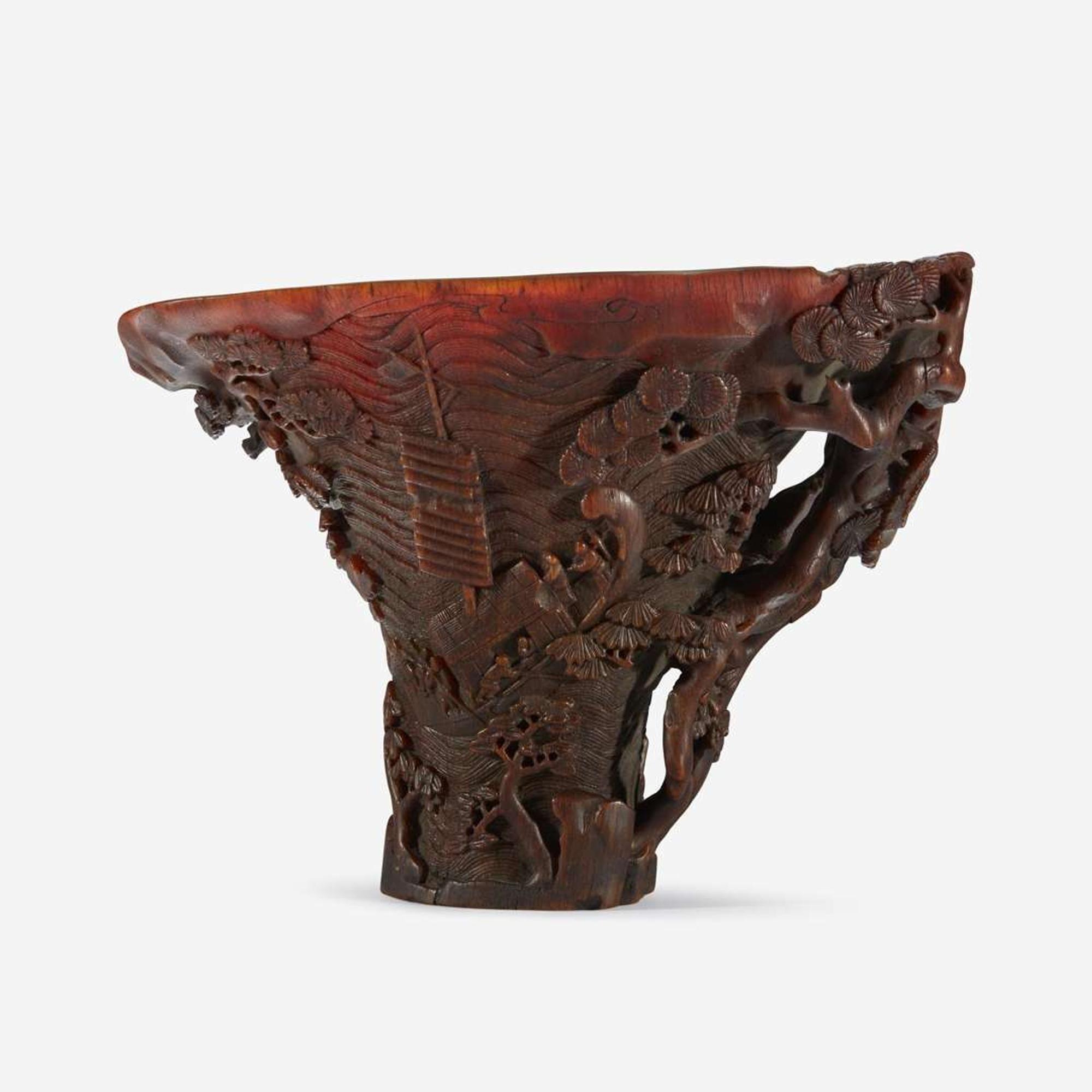 A Chinese Carved Rhinoceros Horn Libation Cup 17th/18th century