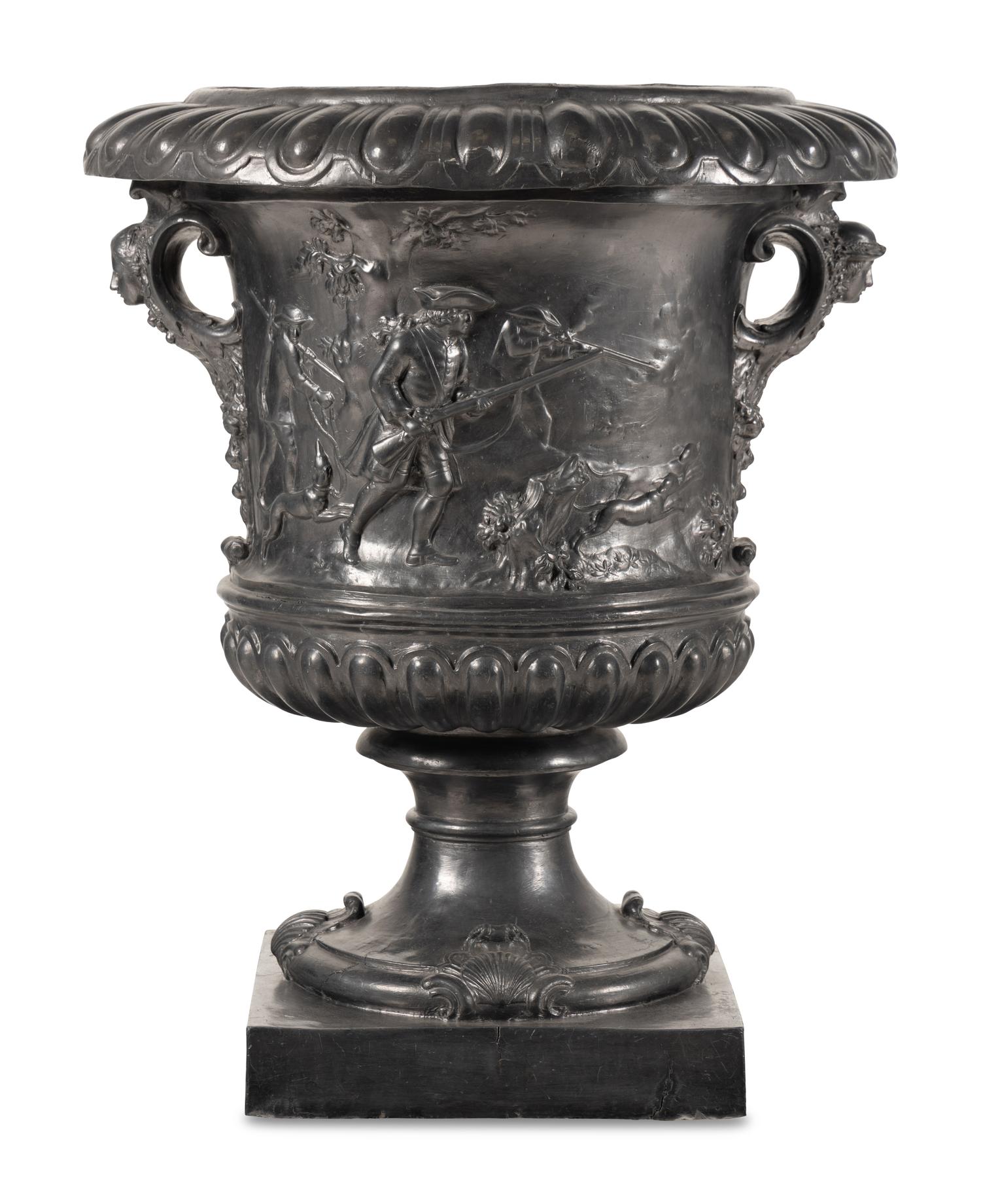 A Pair of English Lead Allegorical Garden Urns