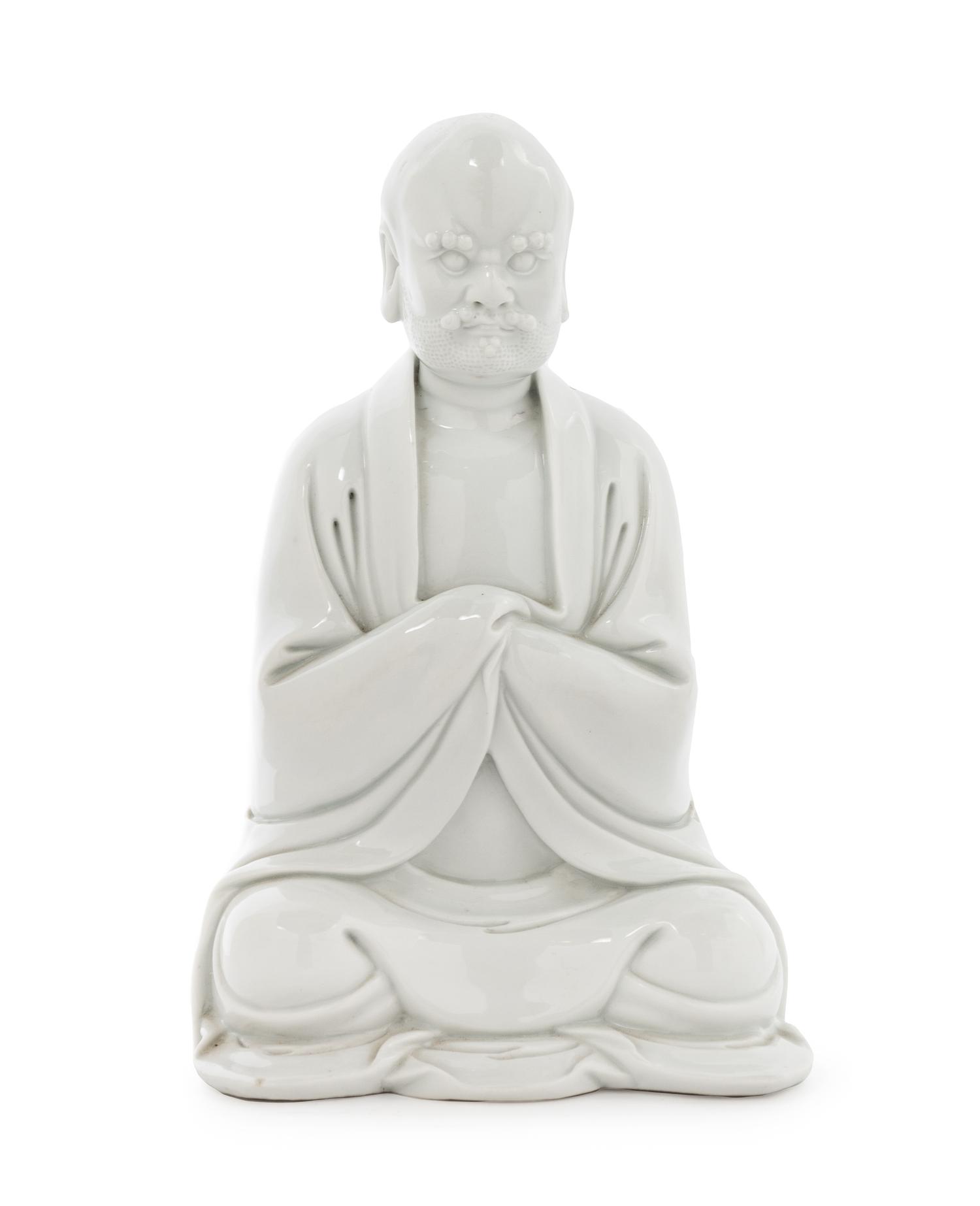 A Chinese Blanc-de Chine Porcelain Figure of Lohan 19TH/20TH CENTURY Height 9 inches. — 19TH/20TH CENTURY