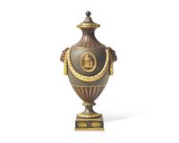 A Wedgwood Brown Glazed and Parcel Gilt Black Basalt Covered Urn
