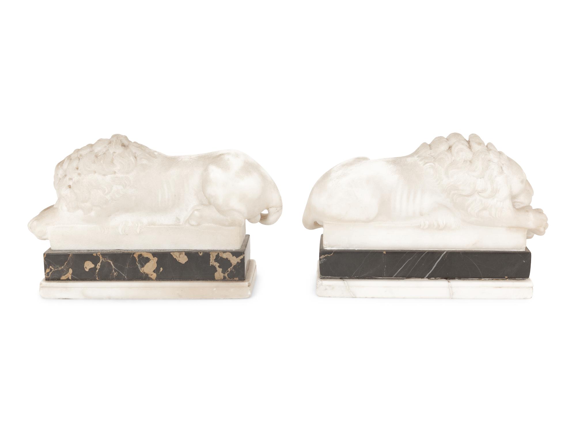 A Pair of Marble Recumbent Lion Bookends