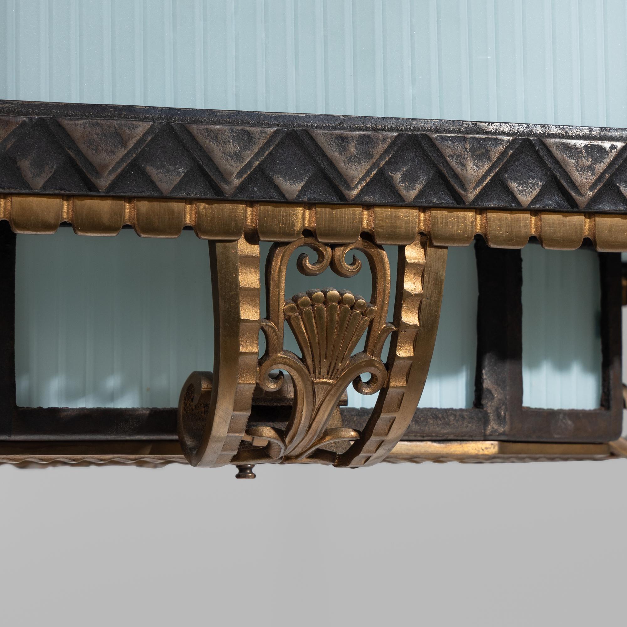 Art Deco Chicago, c. 1929 — Pair of Bronze and Glass Lighting Fixtures from the Palmolive Building