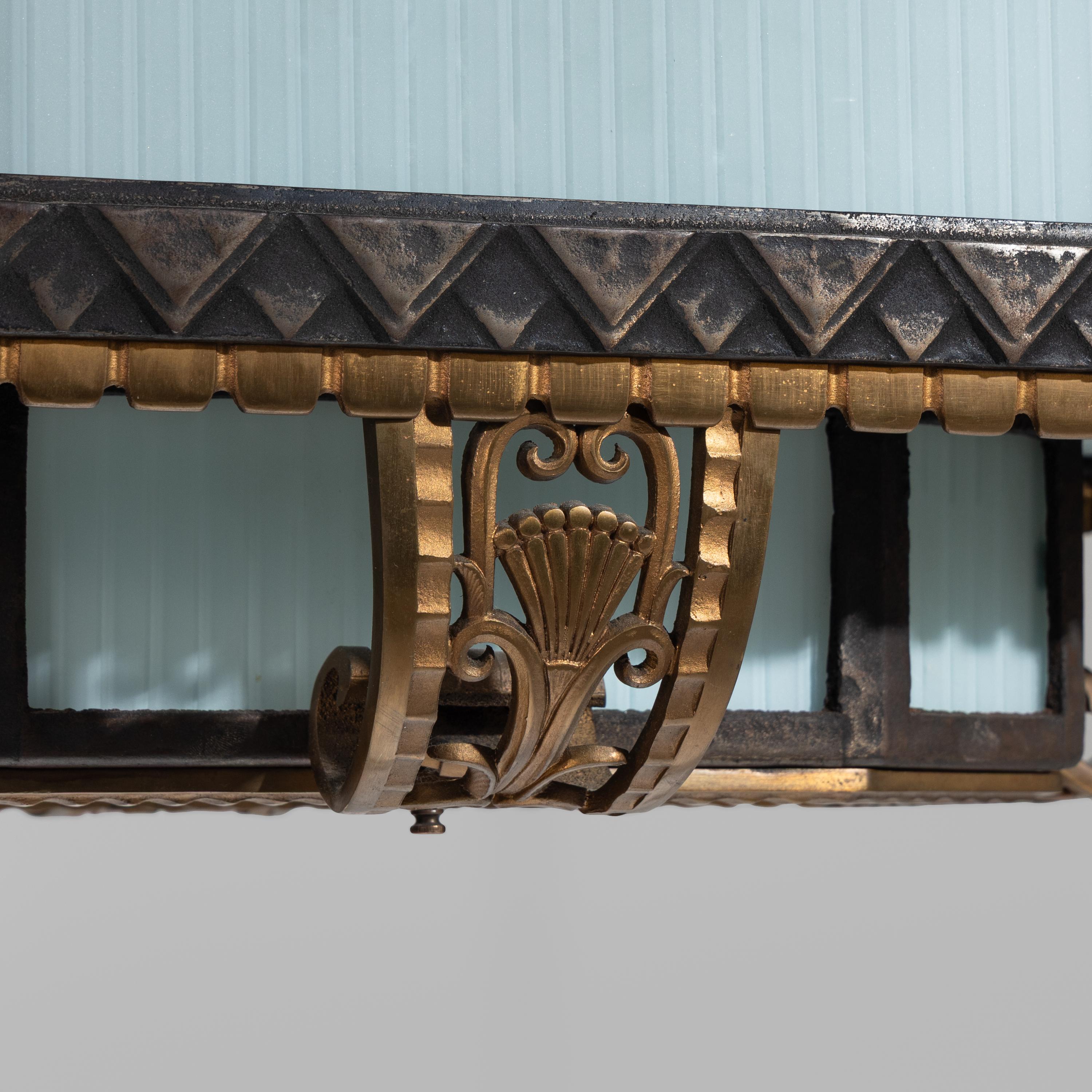 Art Deco Chicago, c. 1929 — Pair of Bronze and Glass Lighting Fixtures
