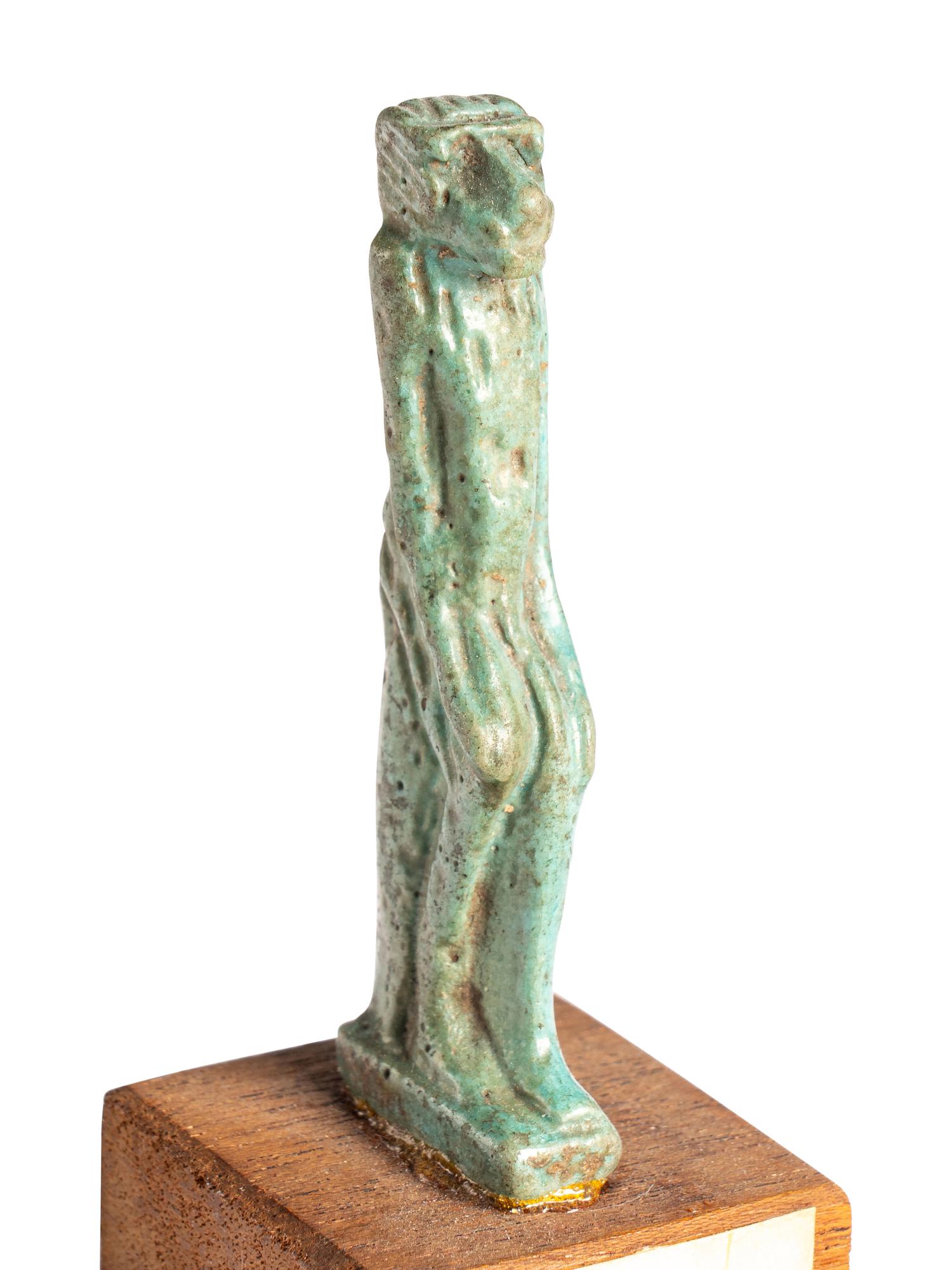 An Egyptian Faience Baboon