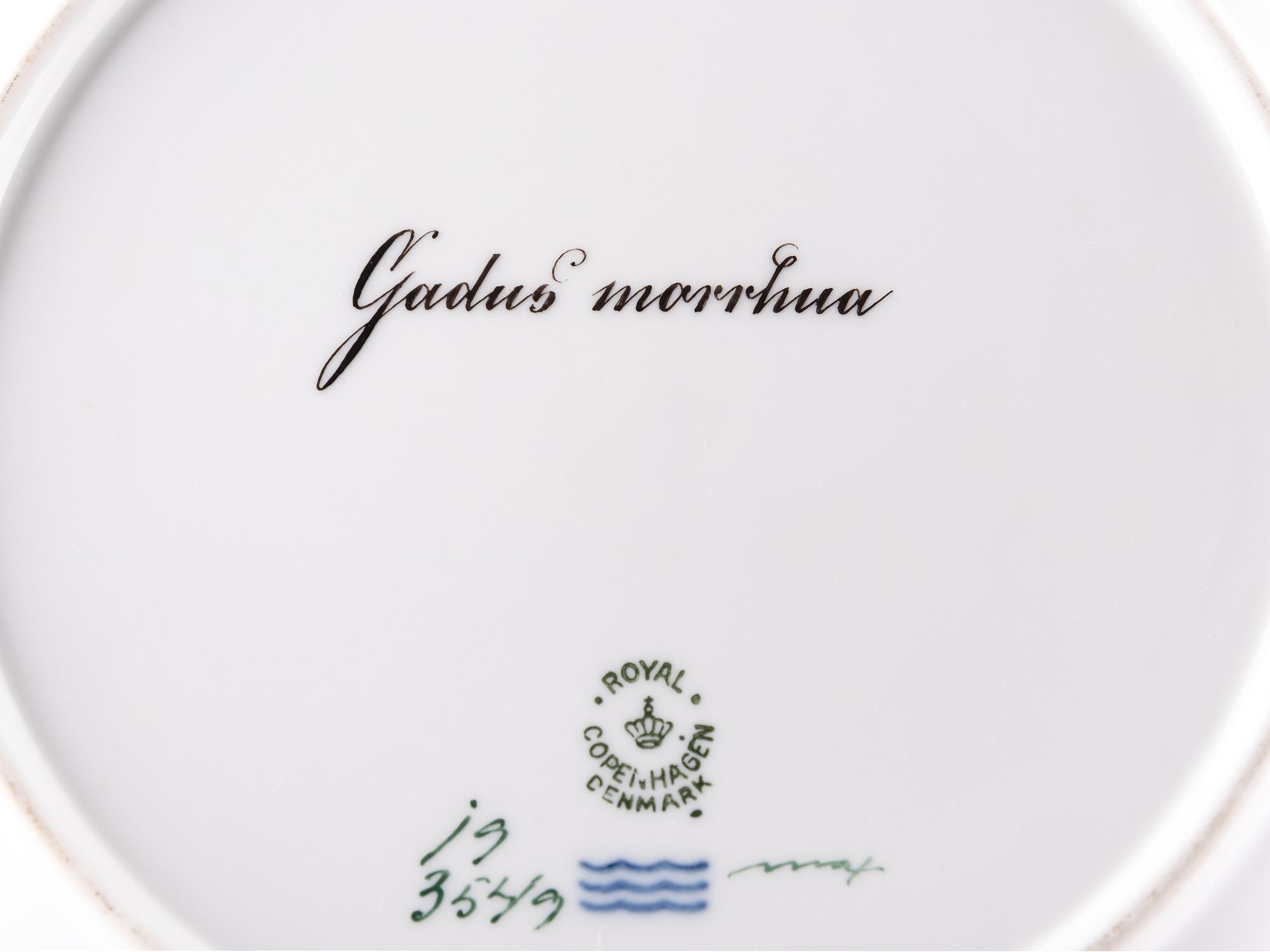 A Set of Twelve Royal Copenhagen Parcel Gilt Porcelain Fish Plates