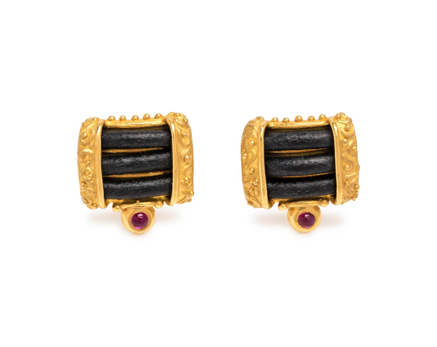 DENISE ROBERGE, HIGH KARAT GOLD, LEATHER AND RUBY EARCLIPS