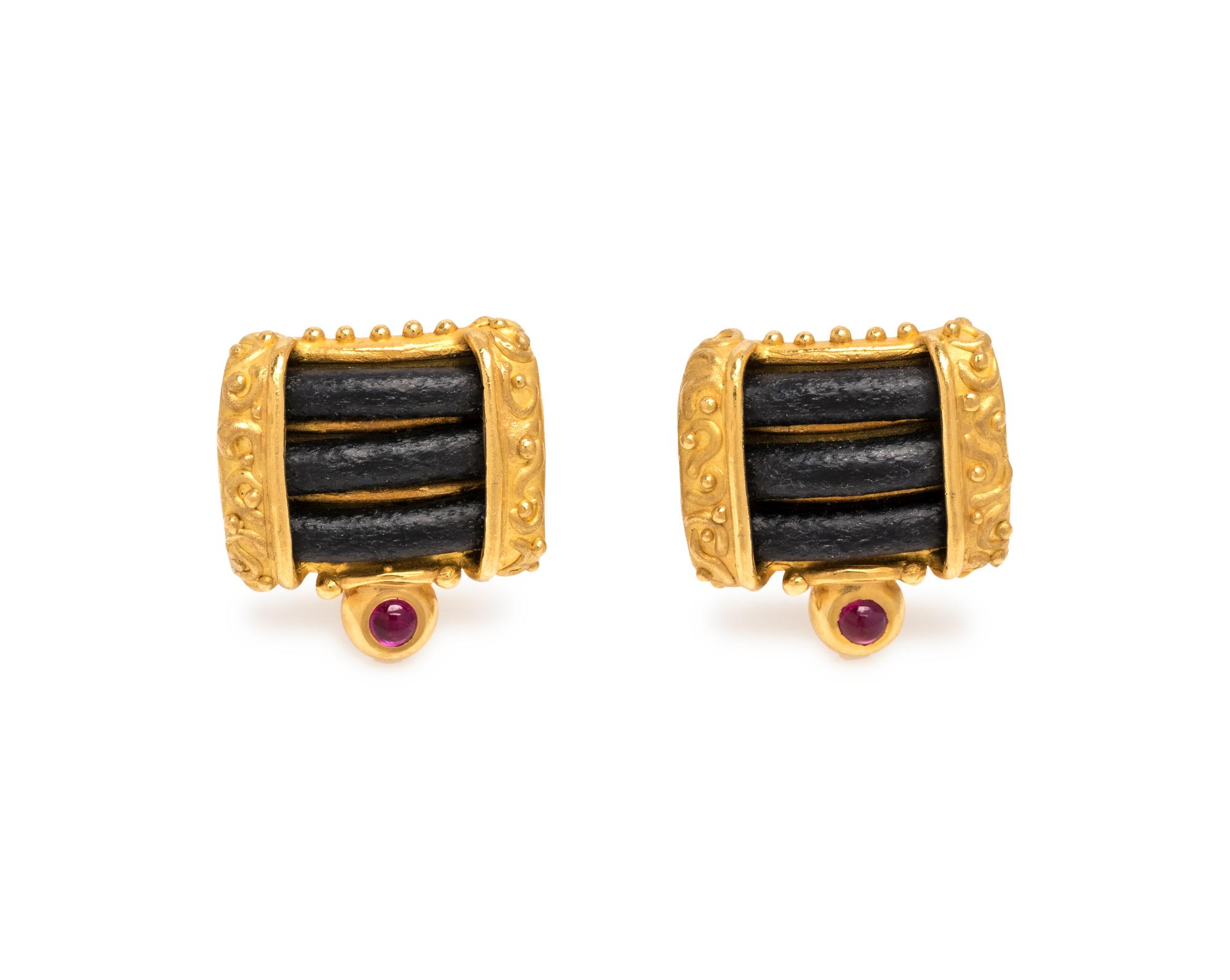 DENISE ROBERGE, HIGH KARAT GOLD, LEATHER AND RUBY EARCLIPS