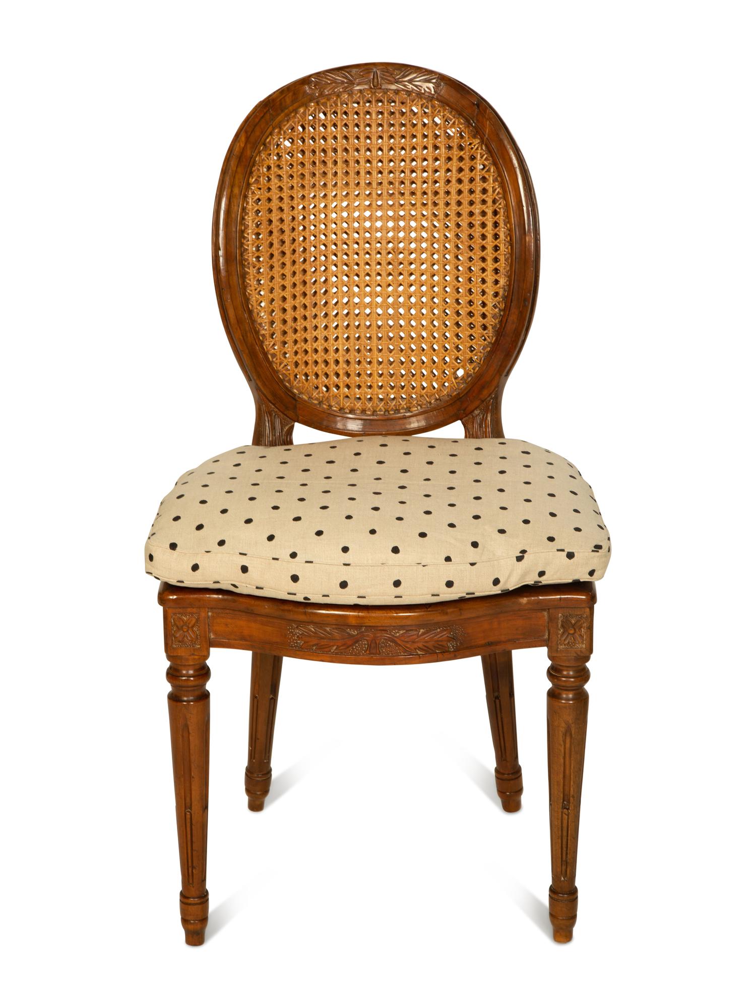A Set of Four Louis XVI Style Side Chairs