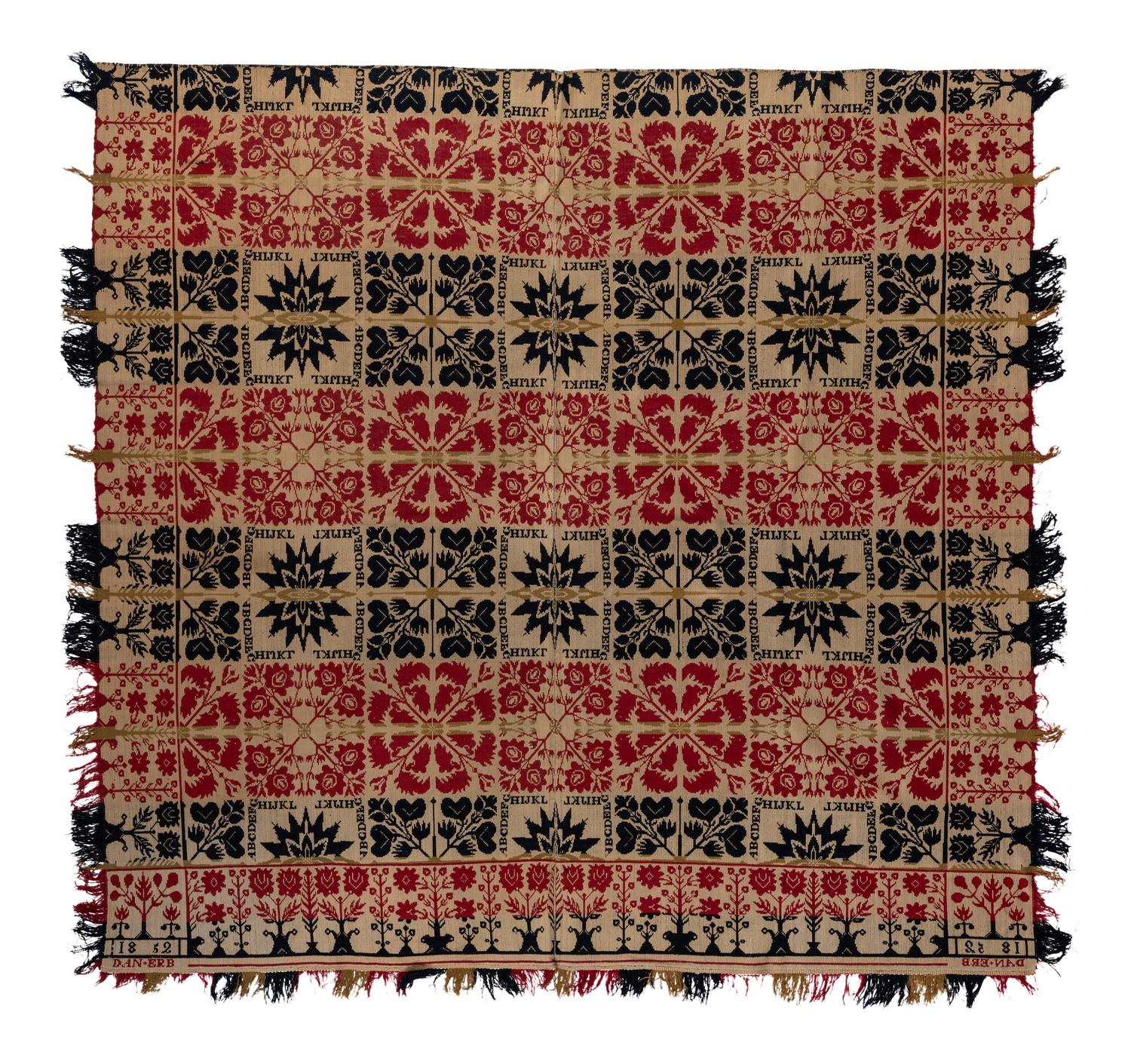 An Alphabet and Foliate Medallion Jacquard Coverlet