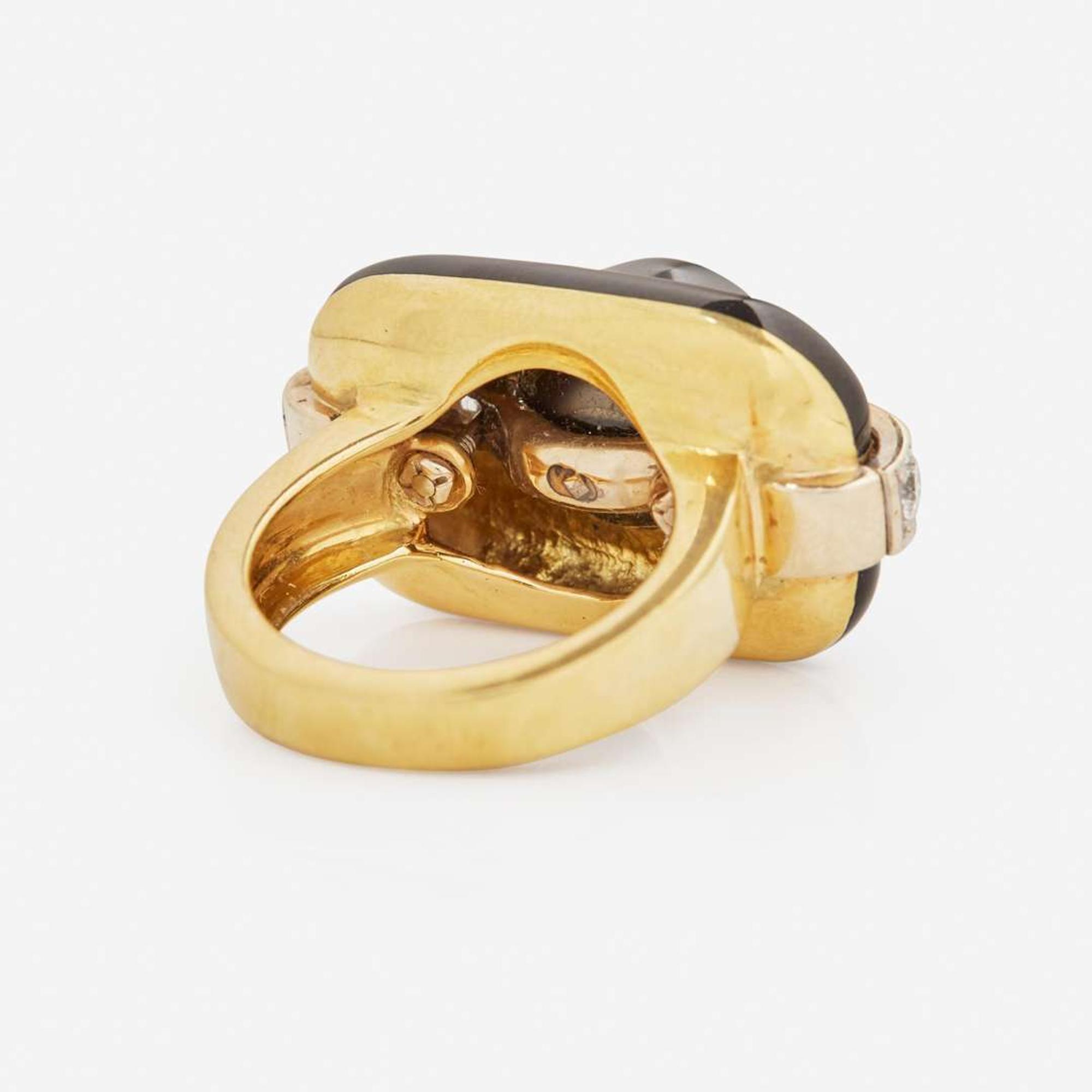 An 18K Yellow Gold, Black Pearl, and Diamond Ring