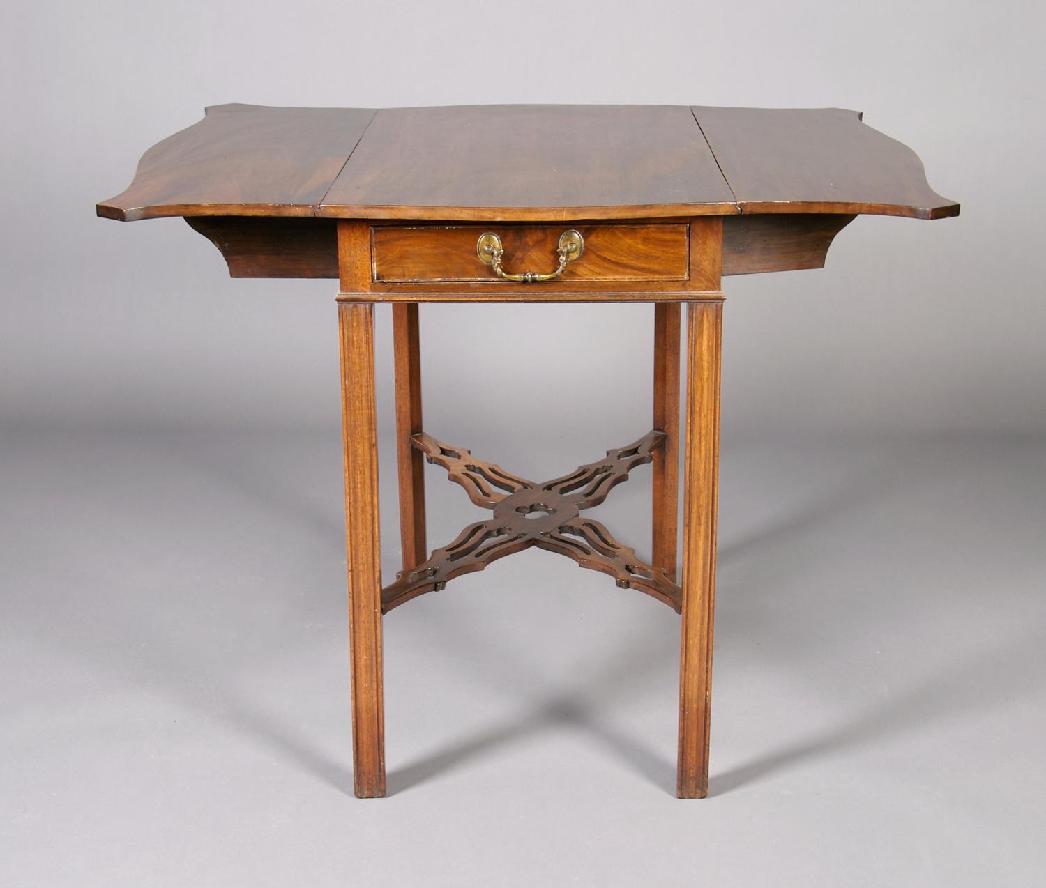 A George III Style Mahogany Pembroke Table, Height 28 1/2 x width 18 x depth 31 1/4 inches closed.