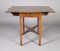 A George III Style Mahogany Pembroke Table, Height 28 1/2 x width 18 x depth 31 1/4 inches closed.