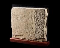 An Egyptian Limestone Relief Fragment Depicting an Offering Scene
