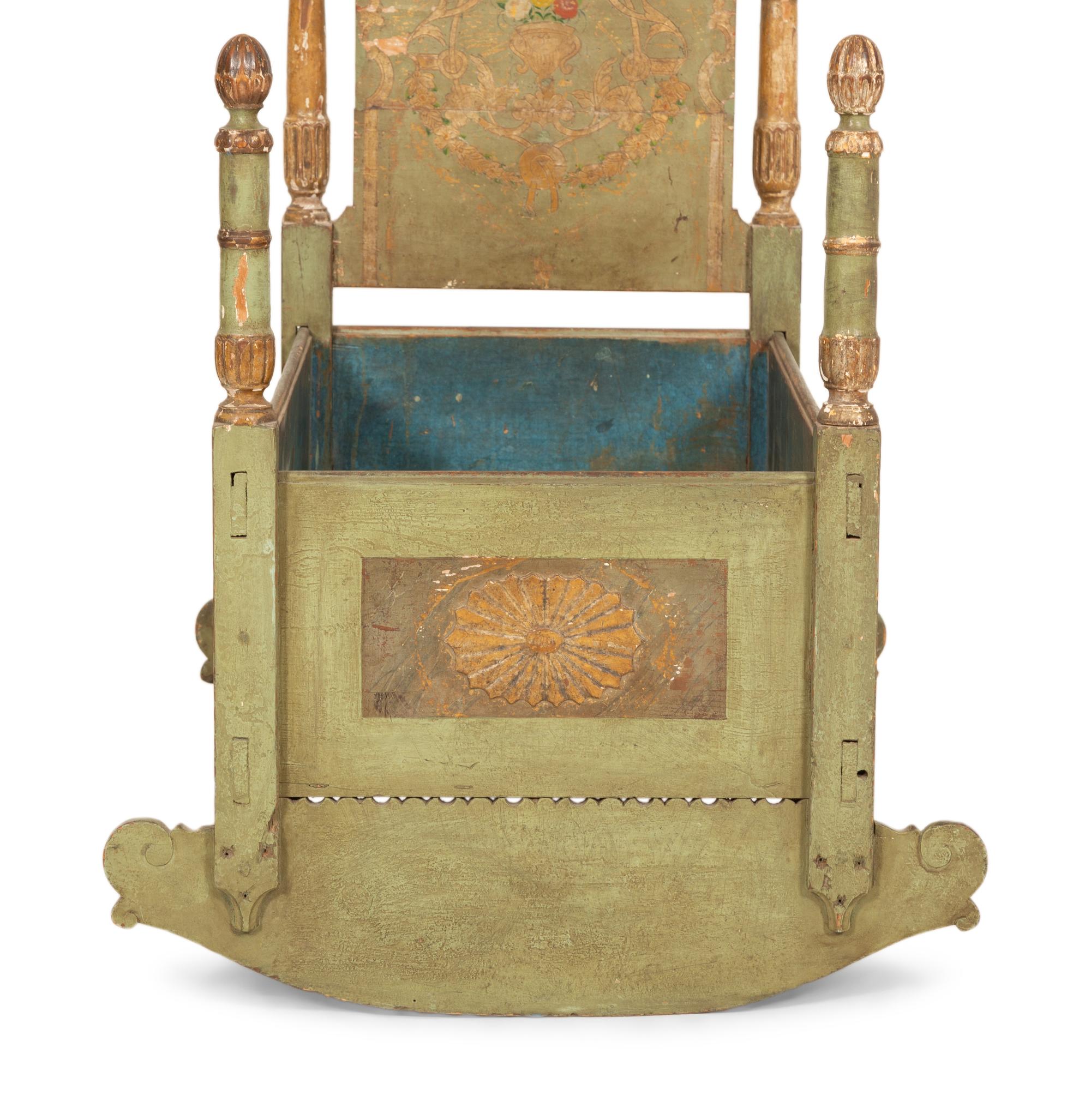 A Venetian Painted and Parcel Gilt Rocking Cradle