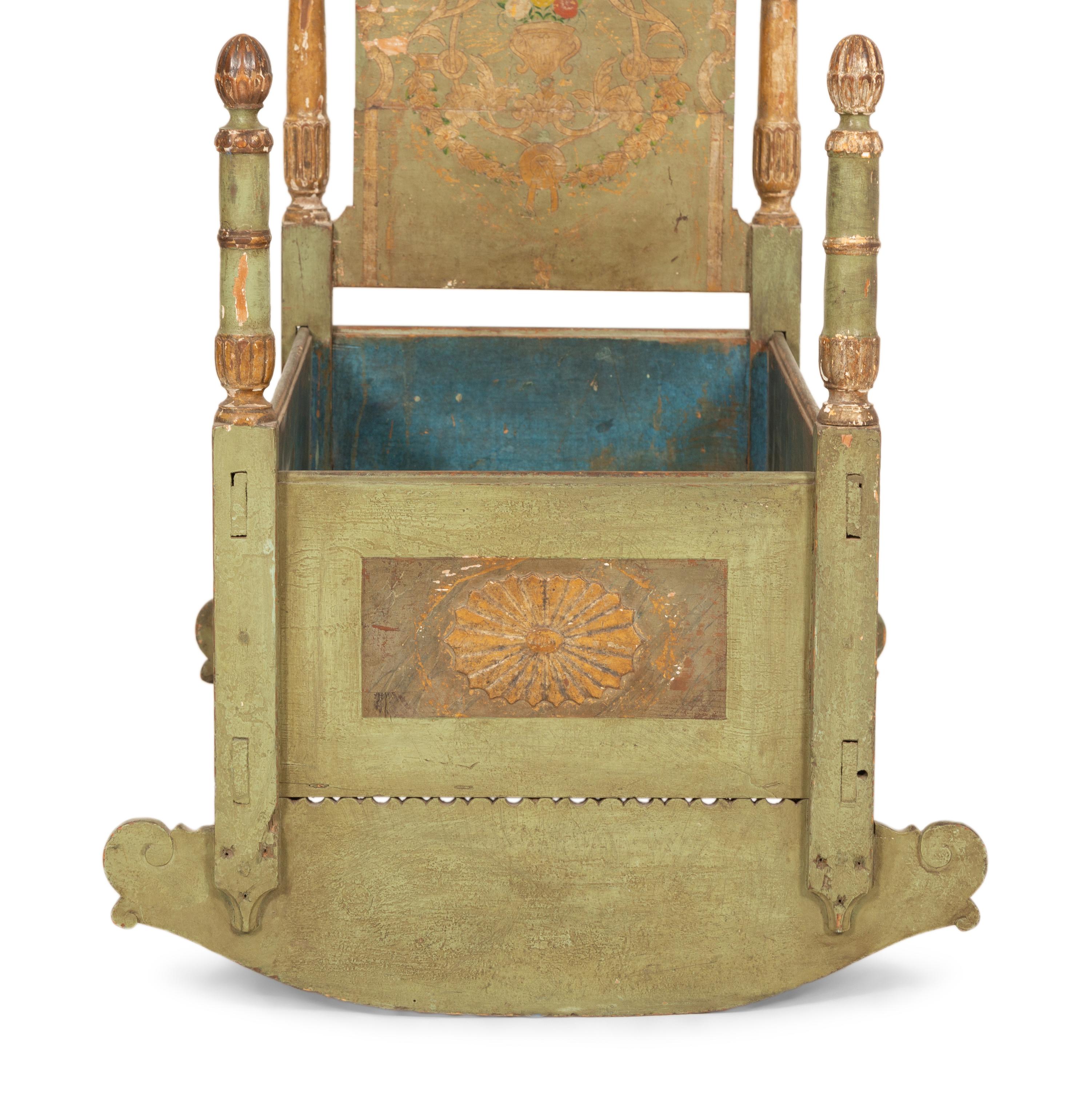 A Venetian Painted and Parcel Gilt Rocking Cradle