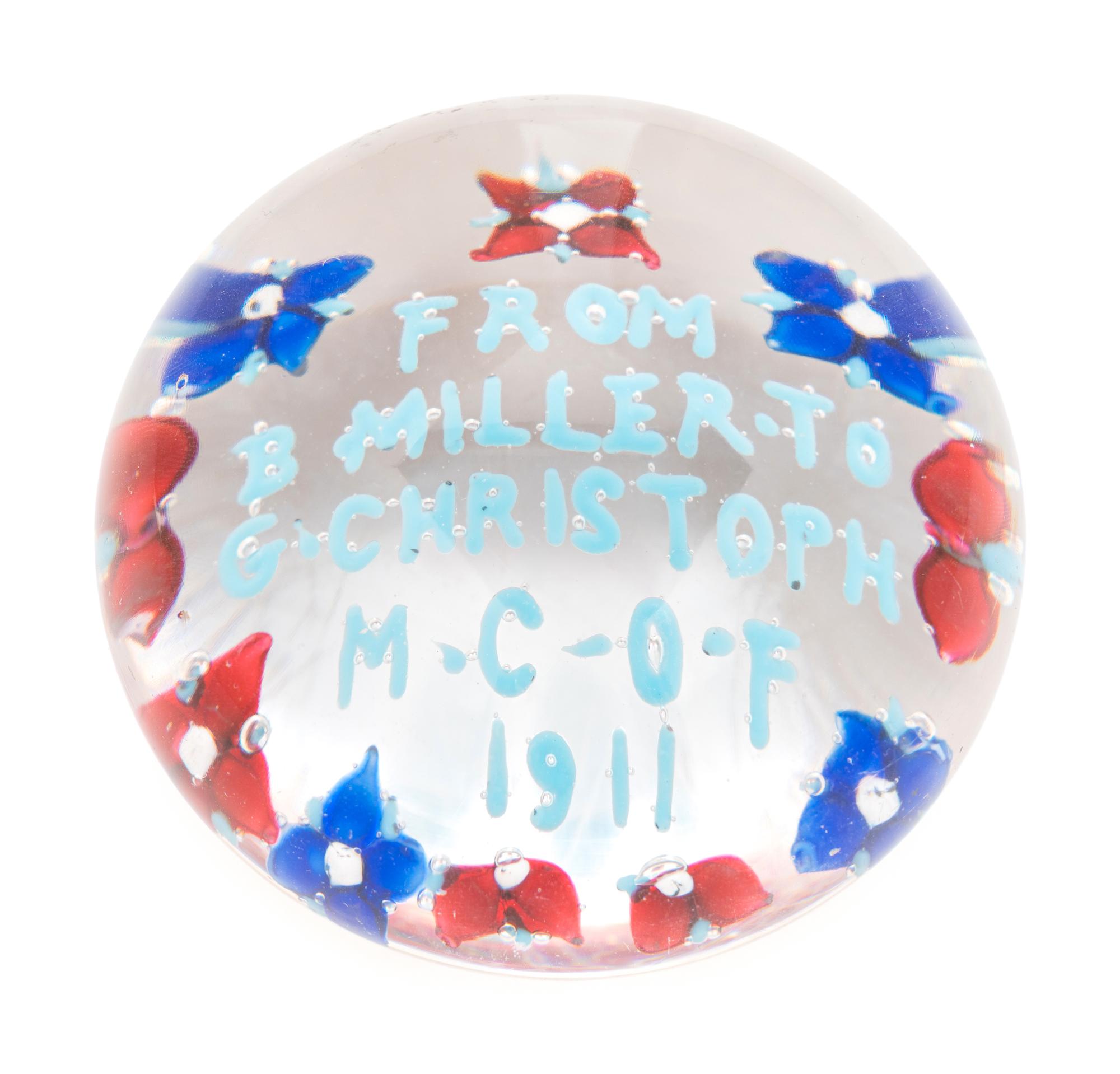 Three American Commemorative Glass Paperweights