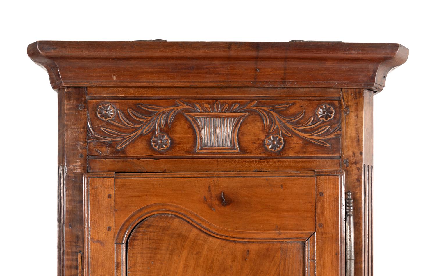 A Louis XV Provincial Walnut Cabinet