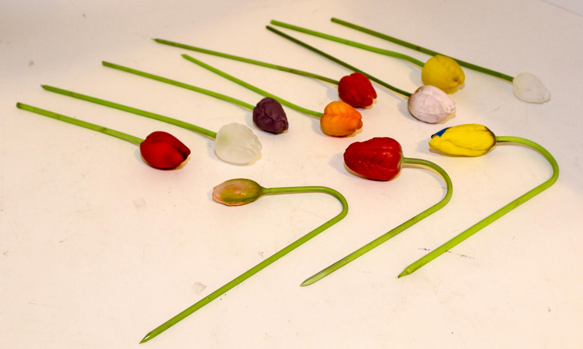 Eleven Italian Blown Glass Flowers. Height of tallest 12 inches.