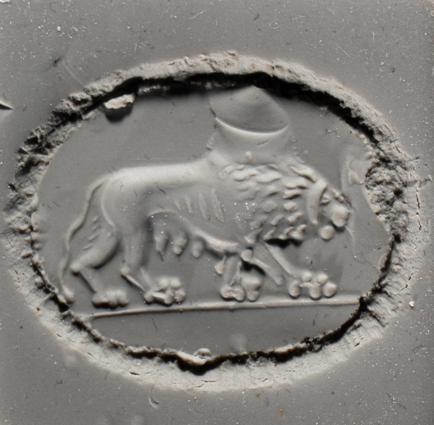 A Roman Agate and Iron Finger Ring with a Lion