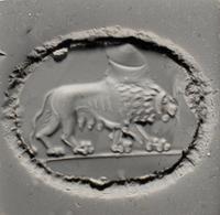 A Roman Agate and Iron Finger Ring with a Lion