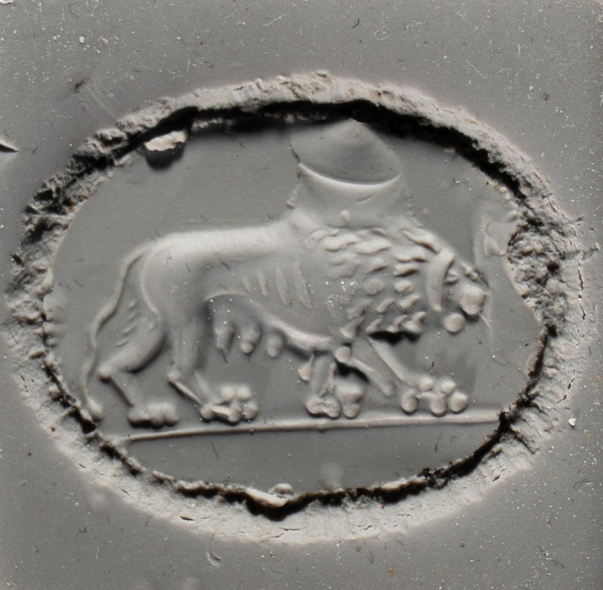 A Roman Agate and Iron Finger Ring with a Lion