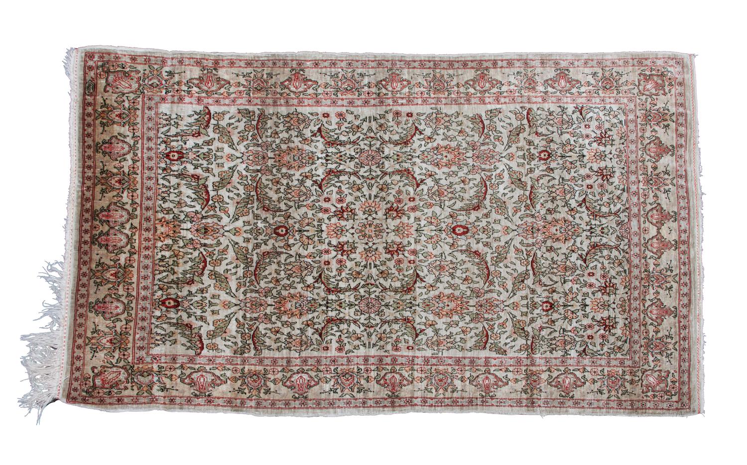 A Turkish Prayer Rug 3 feet 10 1/2 inches x 2 feet 4 1/2 inches.